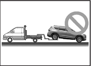 Недопустима буксировка транспортного средства, если передние колеса касаются земли Hyundai Santa Fe с 2018