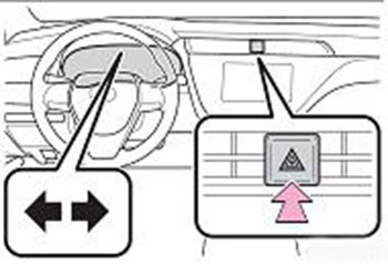 Нажмите кнопку аварийной сигнализации, чтобы включить все указатели поворотов